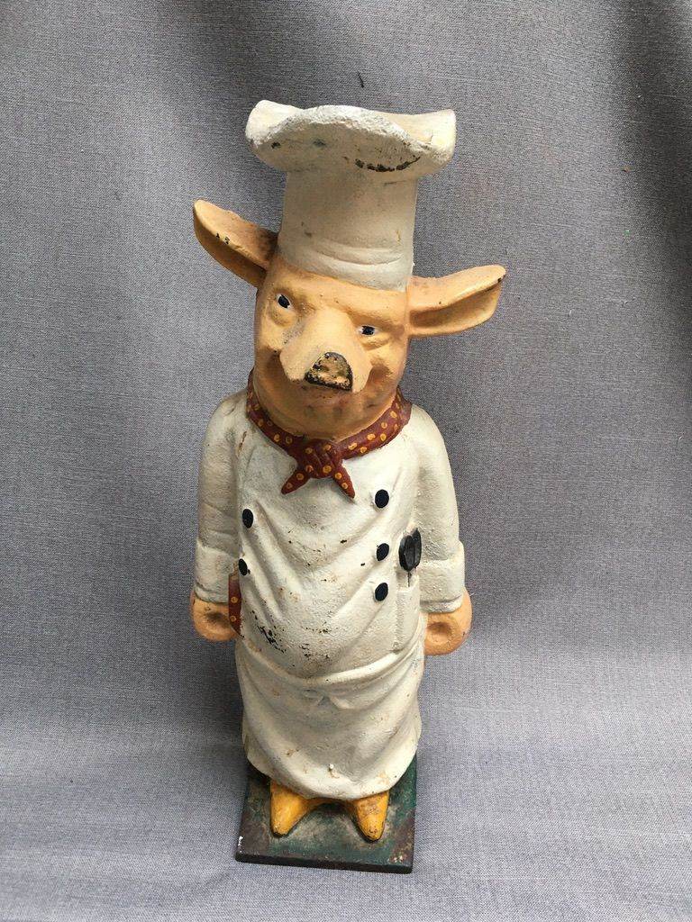 Vintage cast iron pig that can be used for butcher's shop display