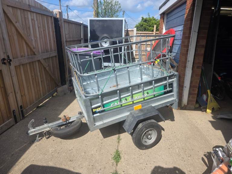 Trailer with cage and covers