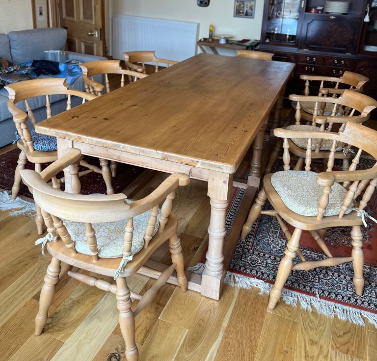A fine dining table with 8 chairs
