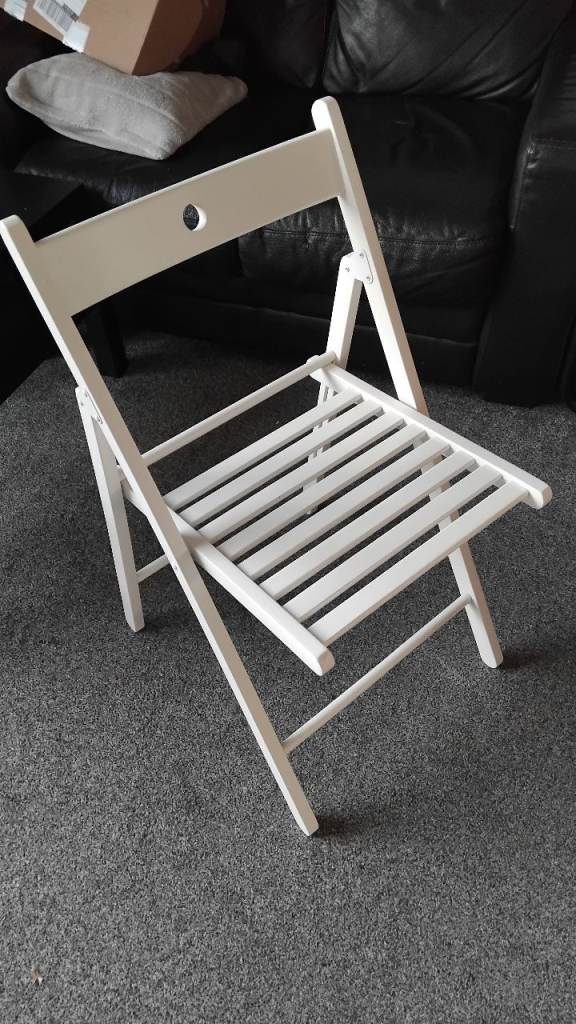 White IKEA folding chair 