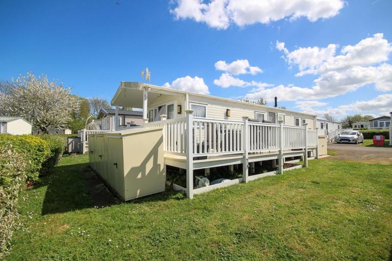 Willerby Avonmore 2019 static caravan sited at Allhallows, Kent. Decking