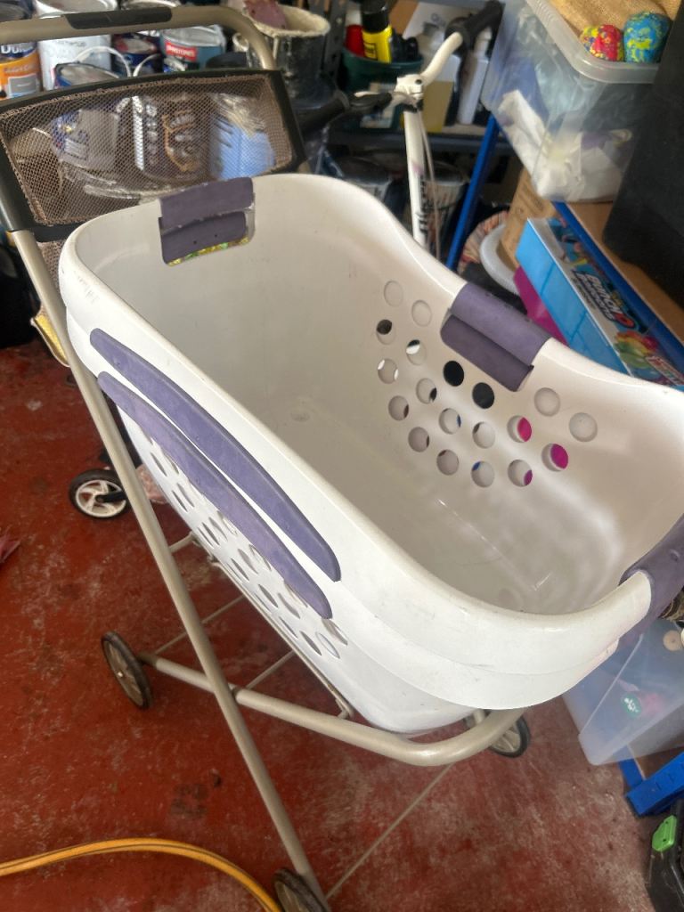 Wheeled washing/laundry basket with two baskets 