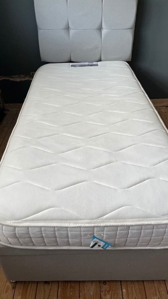 Single divan bed with mattress and headboard 