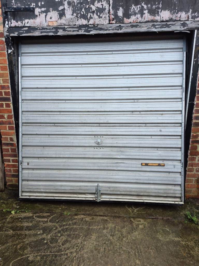 Used up and over galvanised garage door for sale