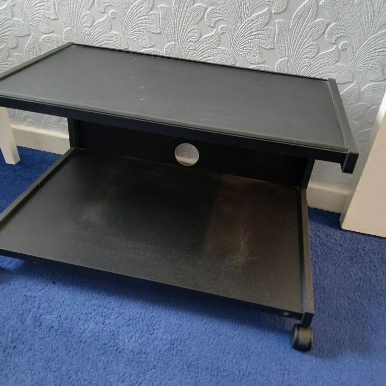 Black TV Unit / Stand on Wheels – Good Condition