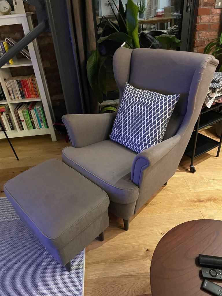 Grey armchair with footstool, good condition