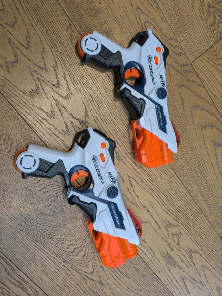 Two Nerf Laser Ops Pro guns