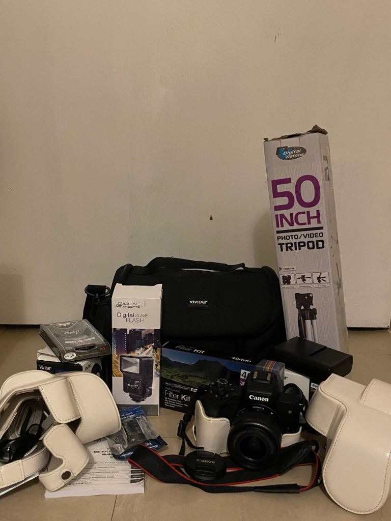 Canon EOS M50 Camera Complete Bundle | Lens, Tripod, Flash, Bag 